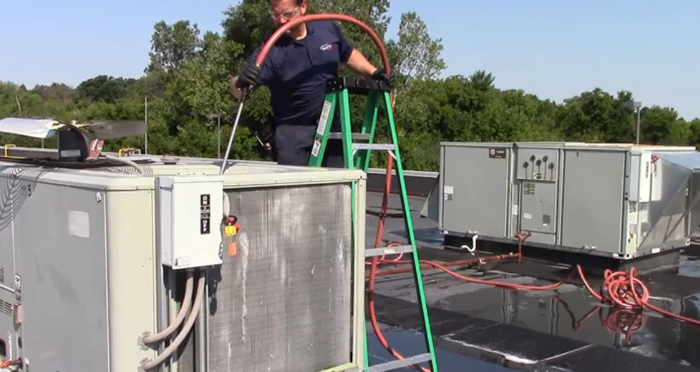 tech looking at coils