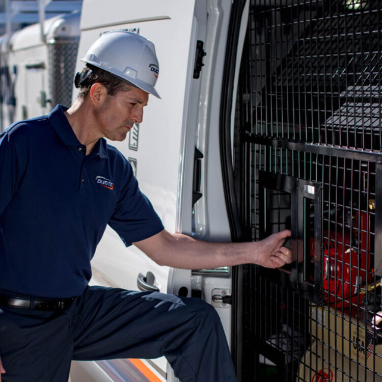 DUCTZ service technician performing multi-unit dryer vent service